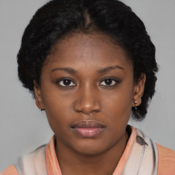 Neutral black young-adult female with short  brown hair and brown eyes