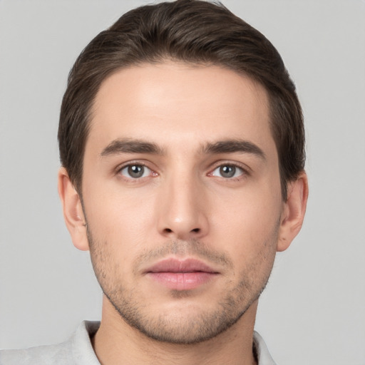 Neutral white young-adult male with short  brown hair and brown eyes