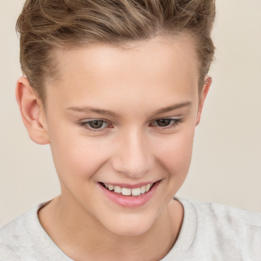 Joyful white child female with short  brown hair and brown eyes