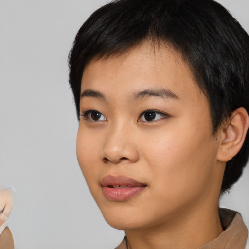 Neutral asian young-adult female with short  black hair and brown eyes