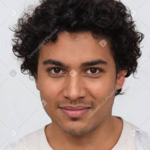 Joyful latino young-adult male with short  brown hair and brown eyes