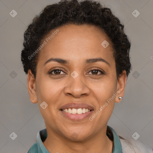 Joyful latino adult female with short  brown hair and brown eyes