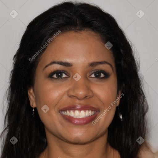 Joyful black young-adult female with long  brown hair and brown eyes