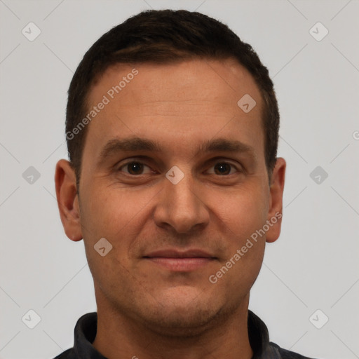 Joyful white young-adult male with short  brown hair and brown eyes