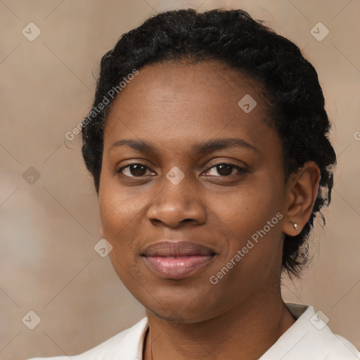 Joyful black young-adult female with medium  black hair and brown eyes