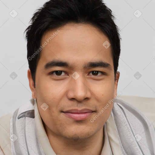 Joyful latino young-adult male with short  brown hair and brown eyes