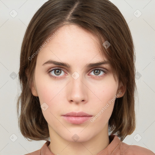 Neutral white young-adult female with medium  brown hair and brown eyes