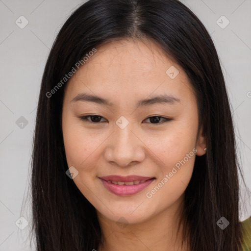 Joyful asian young-adult female with long  brown hair and brown eyes