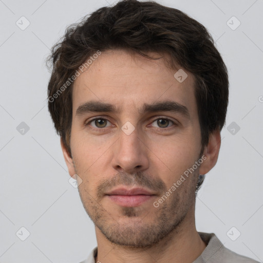 Neutral white young-adult male with short  brown hair and brown eyes