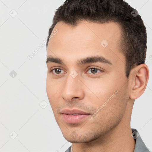 Neutral white young-adult male with short  brown hair and brown eyes