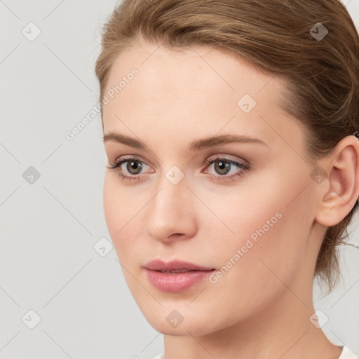 Neutral white young-adult female with long  brown hair and blue eyes