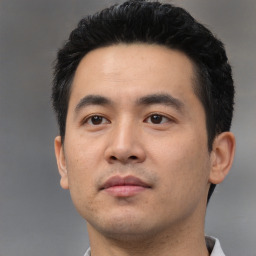 Neutral asian young-adult male with short  black hair and brown eyes