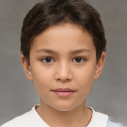 Joyful white child female with short  brown hair and brown eyes