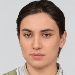 Neutral white young-adult female with medium  brown hair and brown eyes