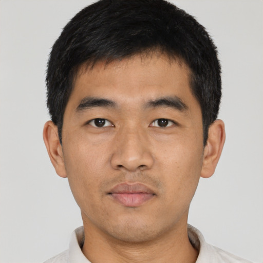Neutral asian young-adult male with short  black hair and brown eyes