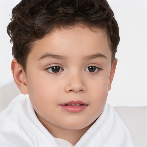 Joyful white child male with short  brown hair and brown eyes