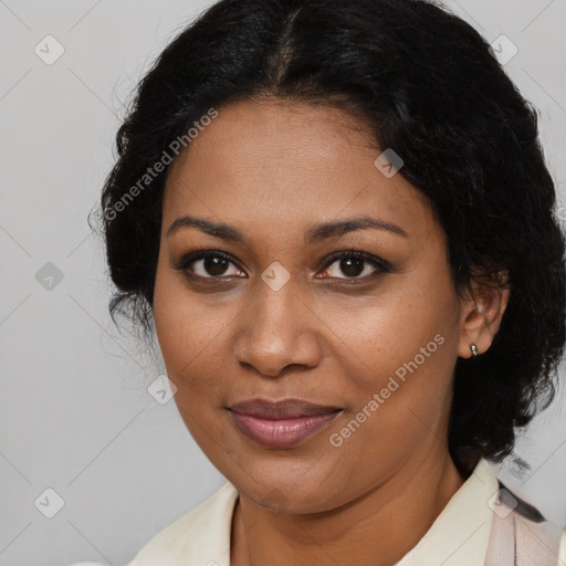 Joyful black young-adult female with medium  brown hair and brown eyes