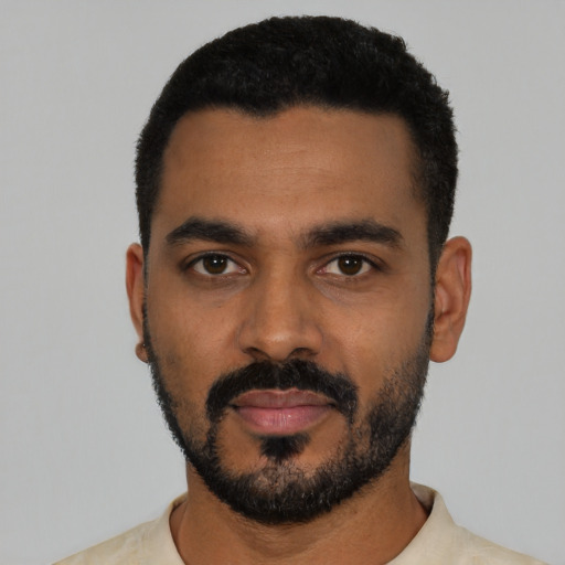 Neutral black young-adult male with short  black hair and brown eyes