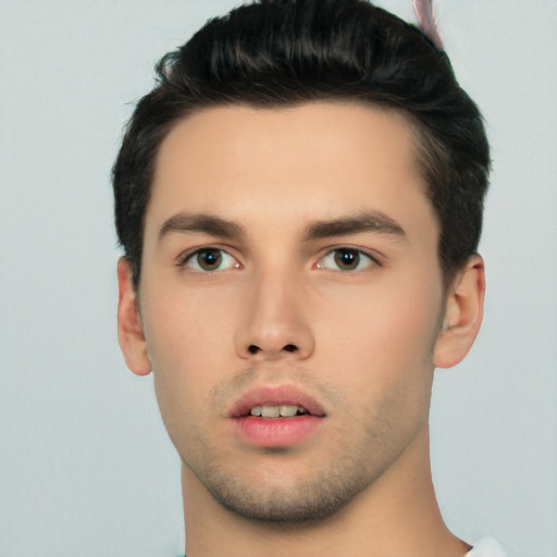 Neutral white young-adult male with short  black hair and brown eyes