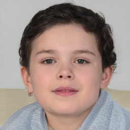 Joyful white child female with short  brown hair and brown eyes