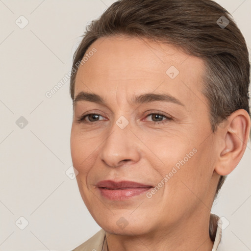 Joyful white adult female with short  brown hair and brown eyes