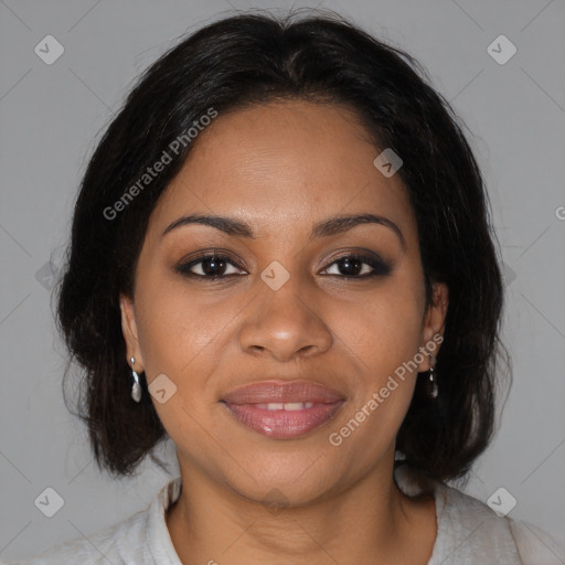 Joyful black adult female with medium  brown hair and brown eyes