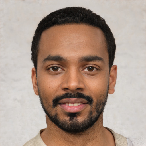 Neutral black young-adult male with short  black hair and brown eyes
