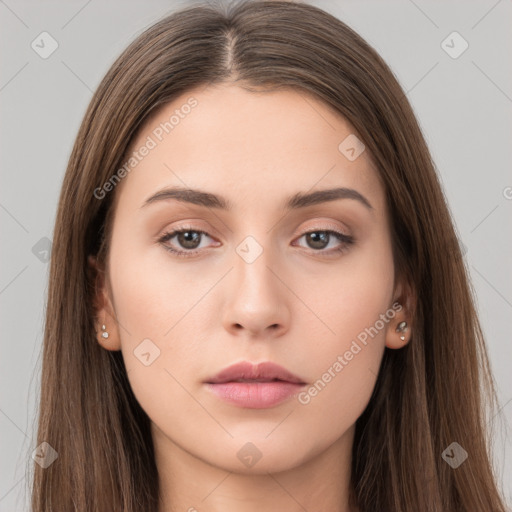 Neutral white young-adult female with long  brown hair and brown eyes