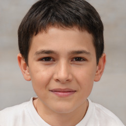 Joyful white child male with short  brown hair and brown eyes