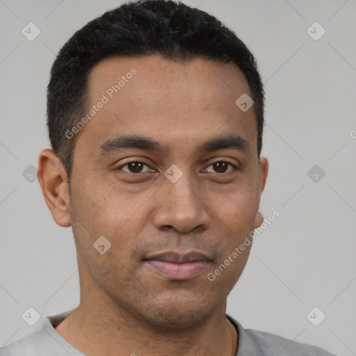 Neutral latino young-adult male with short  black hair and brown eyes