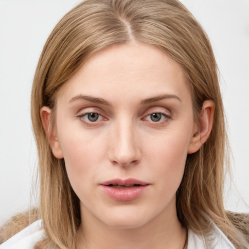 Neutral white young-adult female with long  brown hair and grey eyes