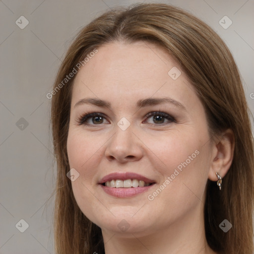 Joyful white young-adult female with long  brown hair and brown eyes