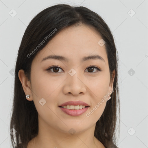 Joyful asian young-adult female with long  brown hair and brown eyes