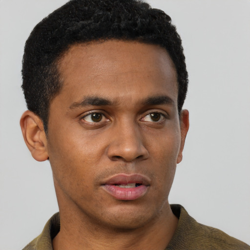 Neutral black young-adult male with short  black hair and brown eyes