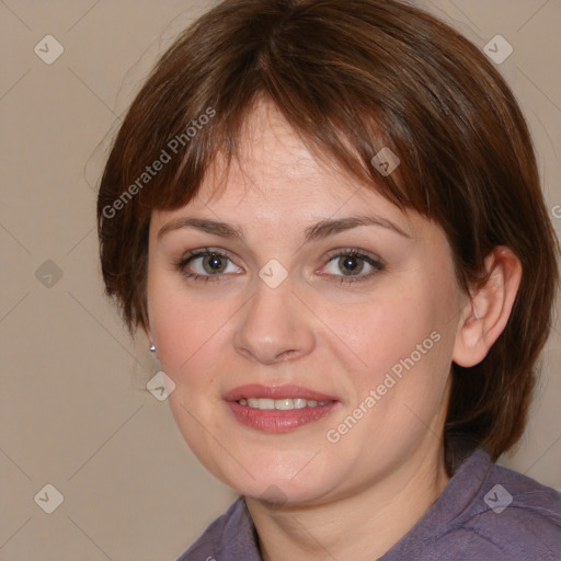 Joyful white young-adult female with medium  brown hair and blue eyes