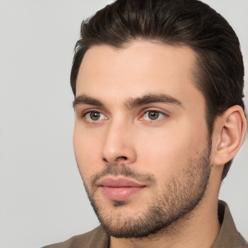 Neutral white young-adult male with short  brown hair and brown eyes