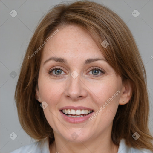 Joyful white adult female with medium  brown hair and grey eyes