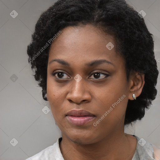 Neutral black young-adult female with short  black hair and brown eyes