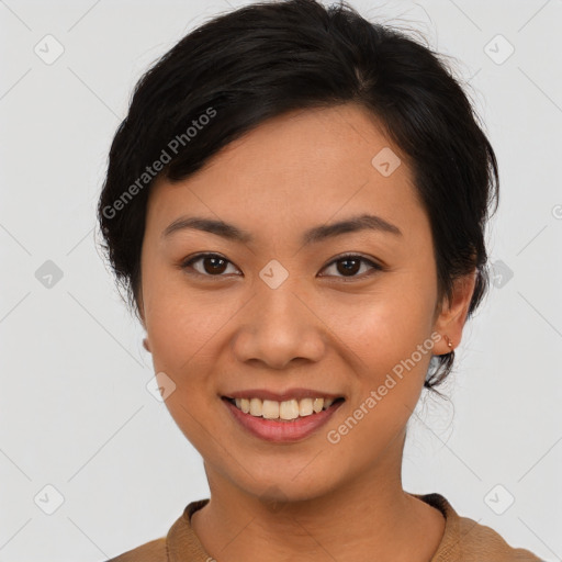 Joyful asian young-adult female with short  black hair and brown eyes