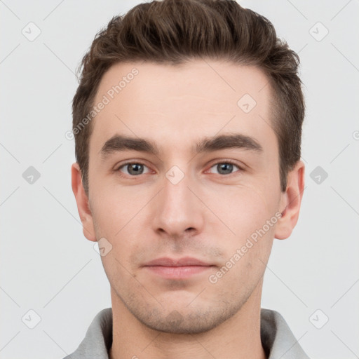 Neutral white young-adult male with short  brown hair and grey eyes