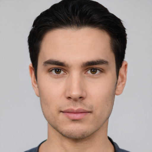 Neutral white young-adult male with short  black hair and brown eyes
