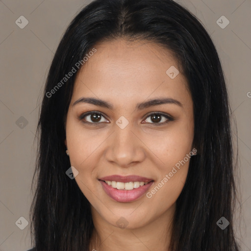 Joyful latino young-adult female with long  brown hair and brown eyes