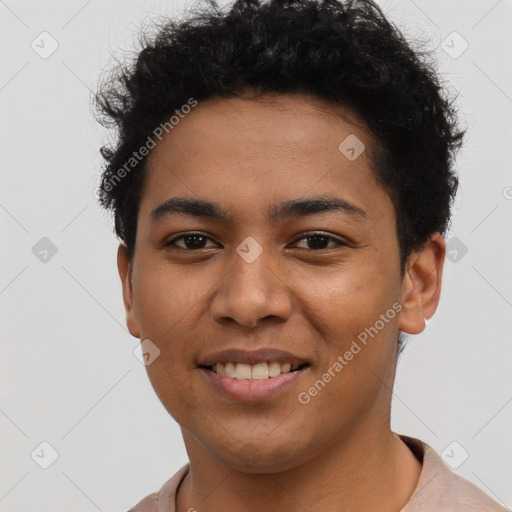 Joyful latino young-adult male with short  brown hair and brown eyes