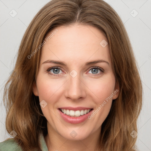 Joyful white young-adult female with medium  brown hair and green eyes