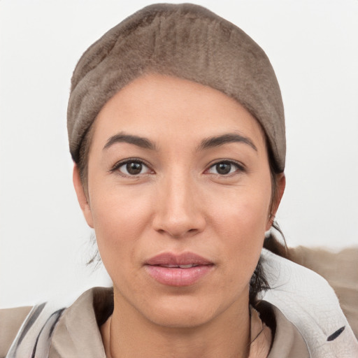 Joyful white young-adult female with short  black hair and brown eyes