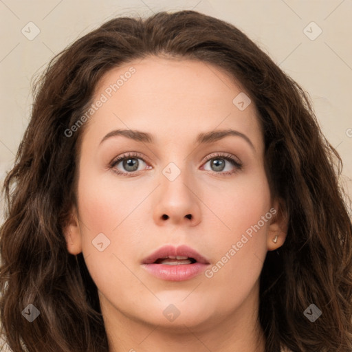 Neutral white young-adult female with long  brown hair and brown eyes