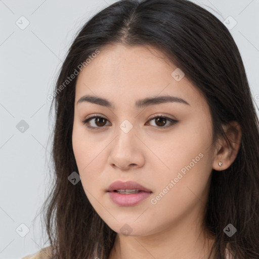 Neutral white young-adult female with long  brown hair and brown eyes