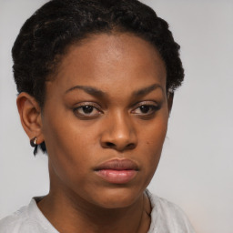 Neutral black young-adult female with short  brown hair and brown eyes