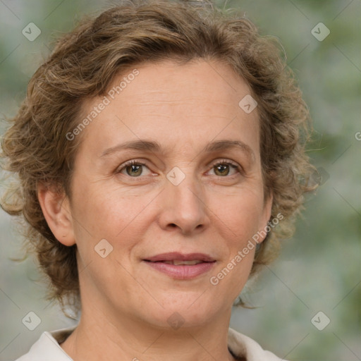 Joyful white adult female with medium  brown hair and green eyes