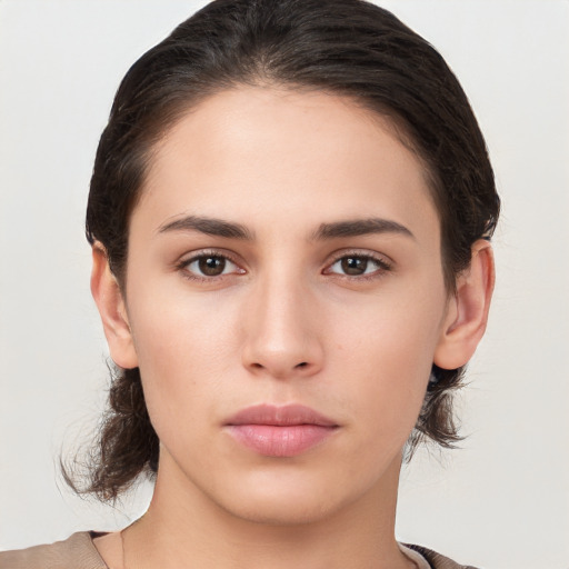 Neutral white young-adult female with medium  brown hair and brown eyes